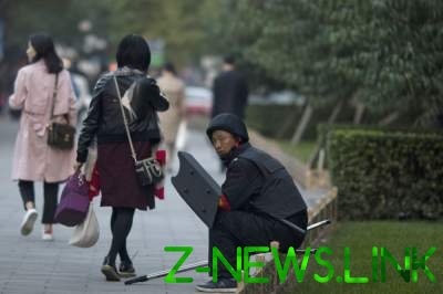 Кадры повседневной жизни людей в Китае. Фото
