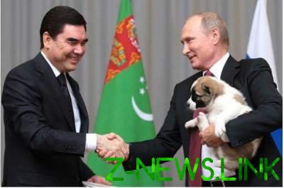 Путин поцеловал подаренного ему щенка